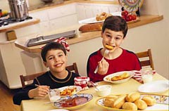boys enjoying pasta