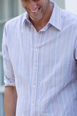 close up of man in striped shirt