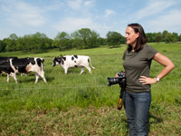 Edwina photographing at a dairy farm